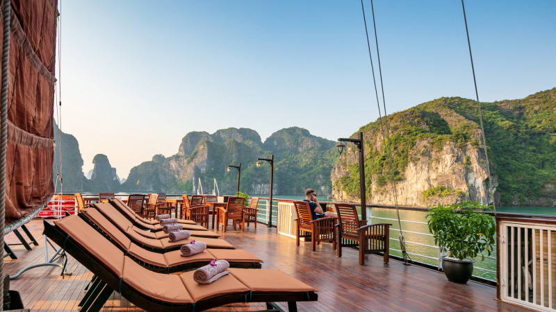 Put your feet up to admire Halong Bay beauty