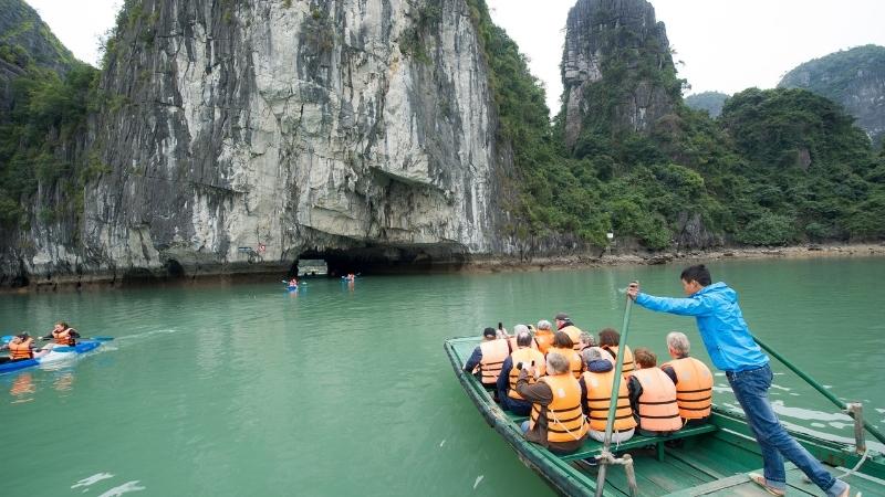 Visit Luon Cave on rowing boat