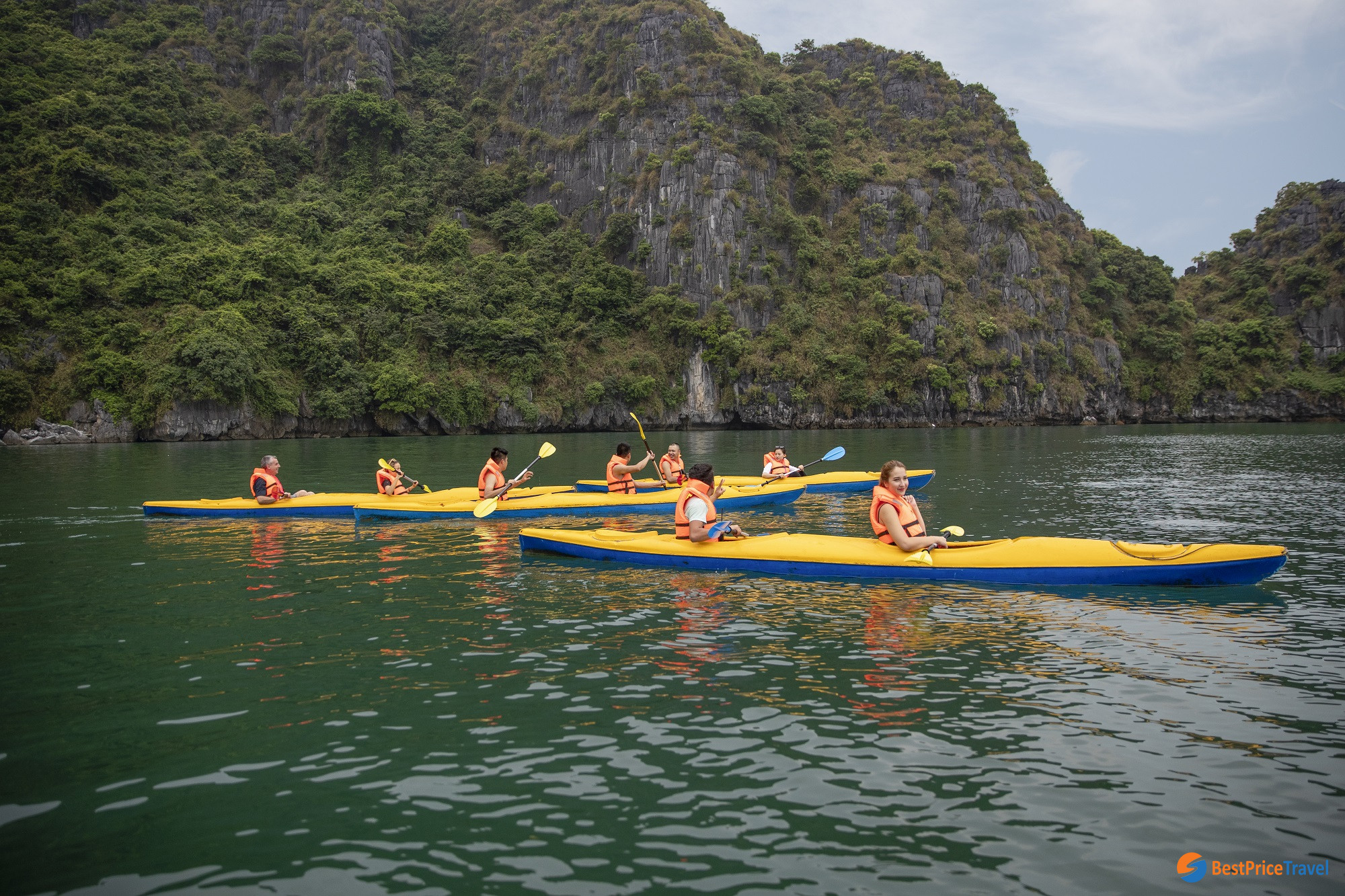 Behold Halong Bay beauty on a kayak