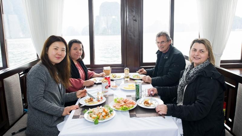 Guests enjoy delicious meal onboard