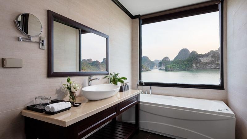 Bathroom with bathtub views to Lan Ha Bay