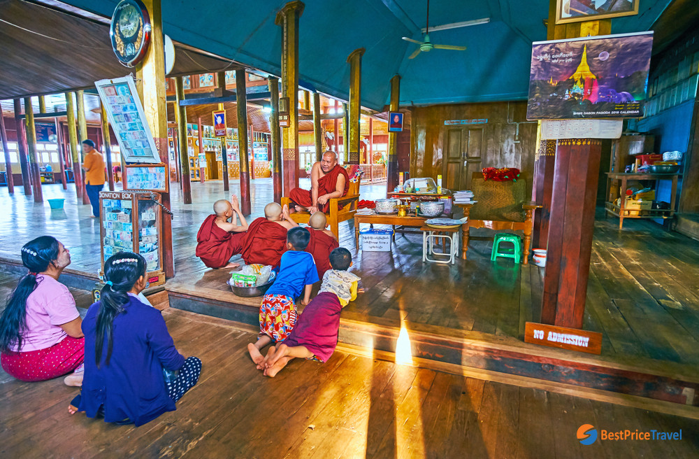 Young Samaneras (novice monks) and their mothers are listening to Bhikkhu Monk