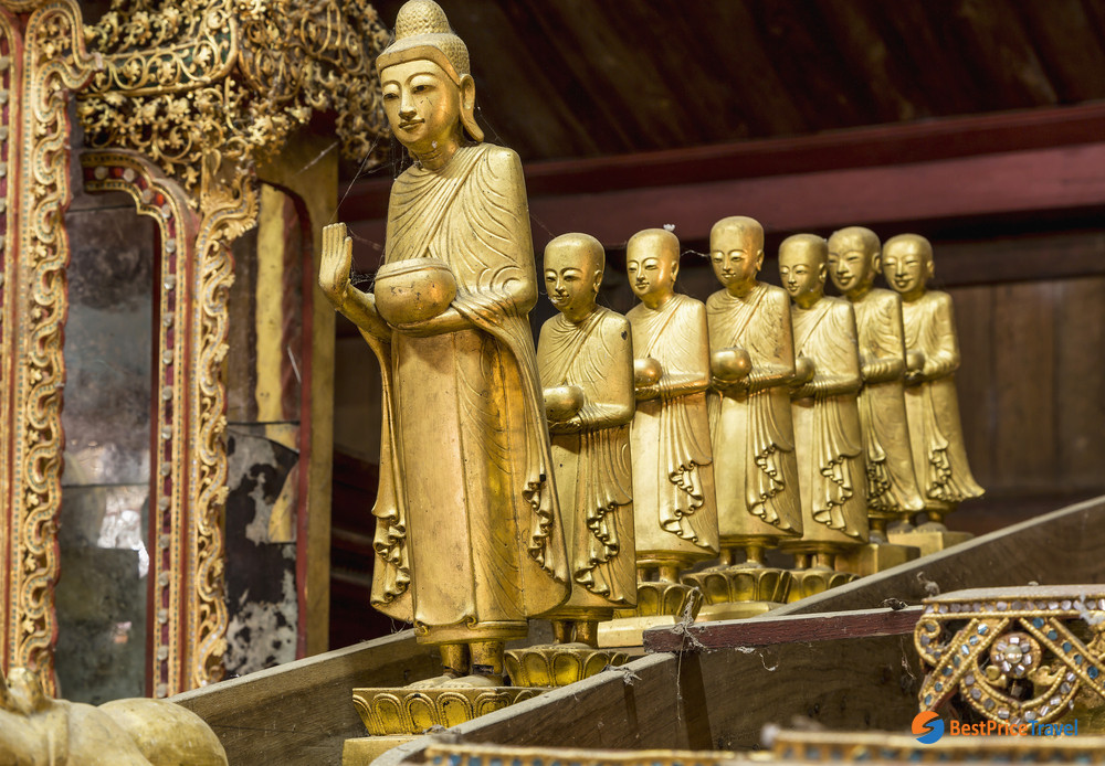Series praying golden Buddhas inside the Nga Phe Kyaung Monastery