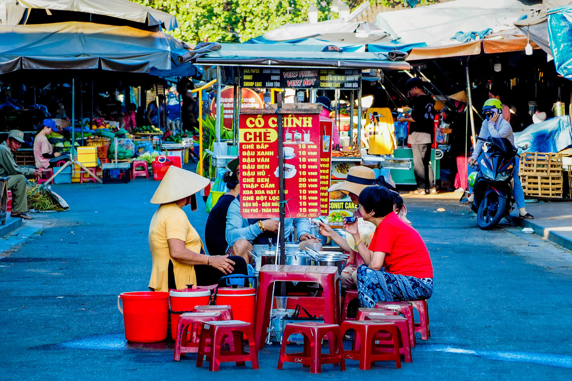 Shop and try local street food at Hoi An Market