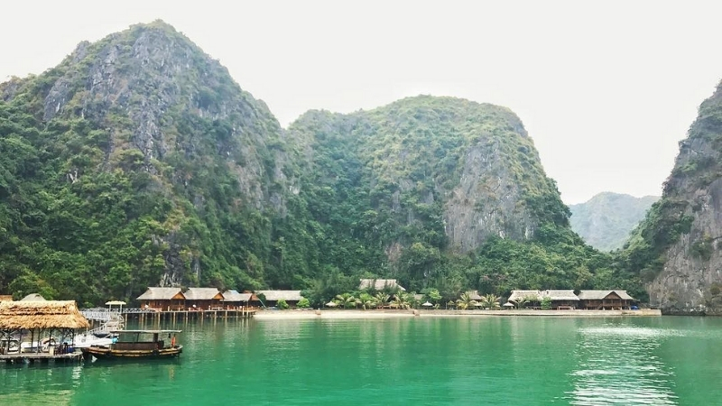 Arrive Nam Cat Island by boat