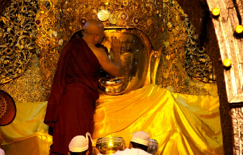 Cleaning Buddha face