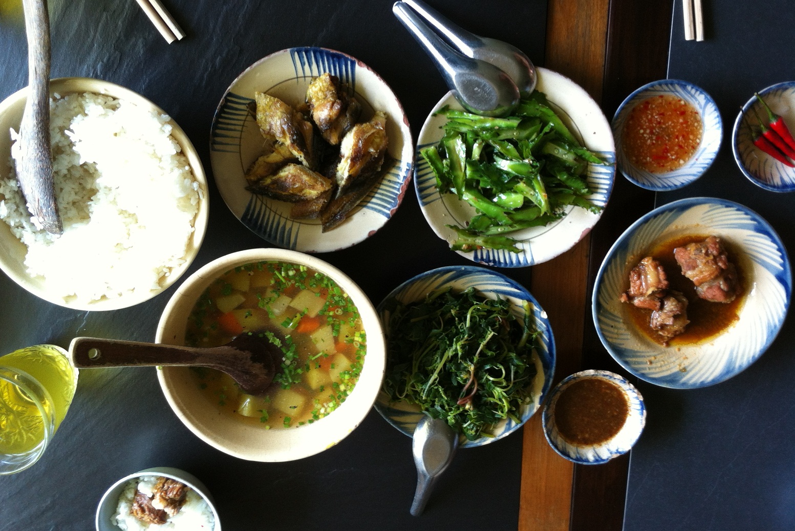 Simple meal of Vietnamese family in rural area