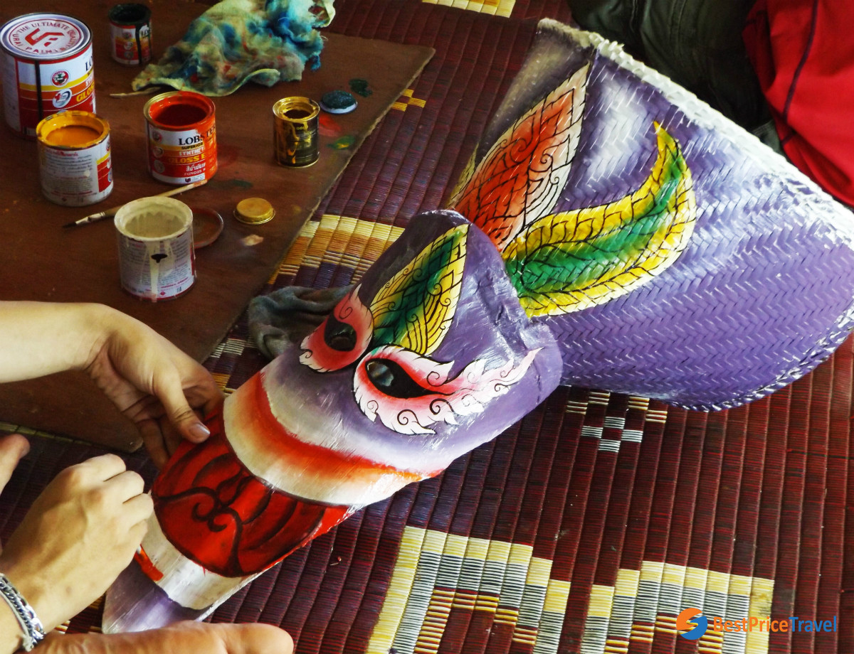 Making the mask for Phi Ta Khon Festival