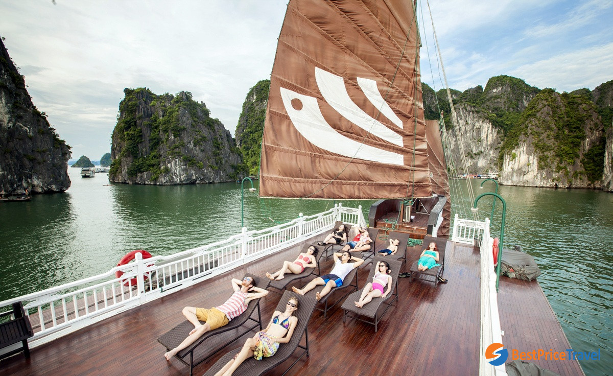 Relaxing On Deck of Halong Bay cruise in autumn
