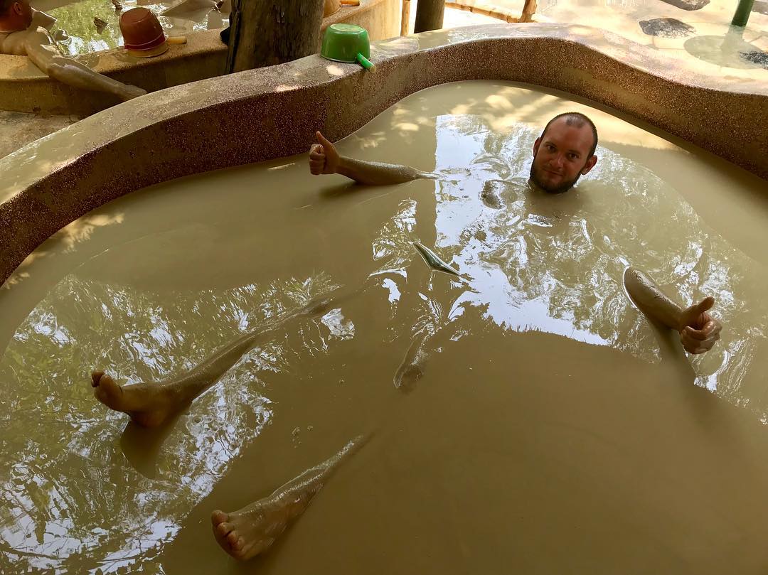 Taking mud bath in Thap Ba Hot Springs Center