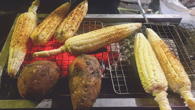 Grilled corn and baked sweet potatoes