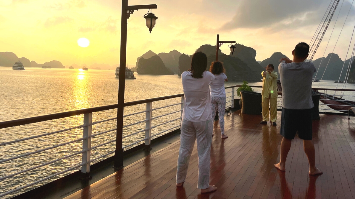 Doing Tai Chi session on the Orchid Trendy Cruise