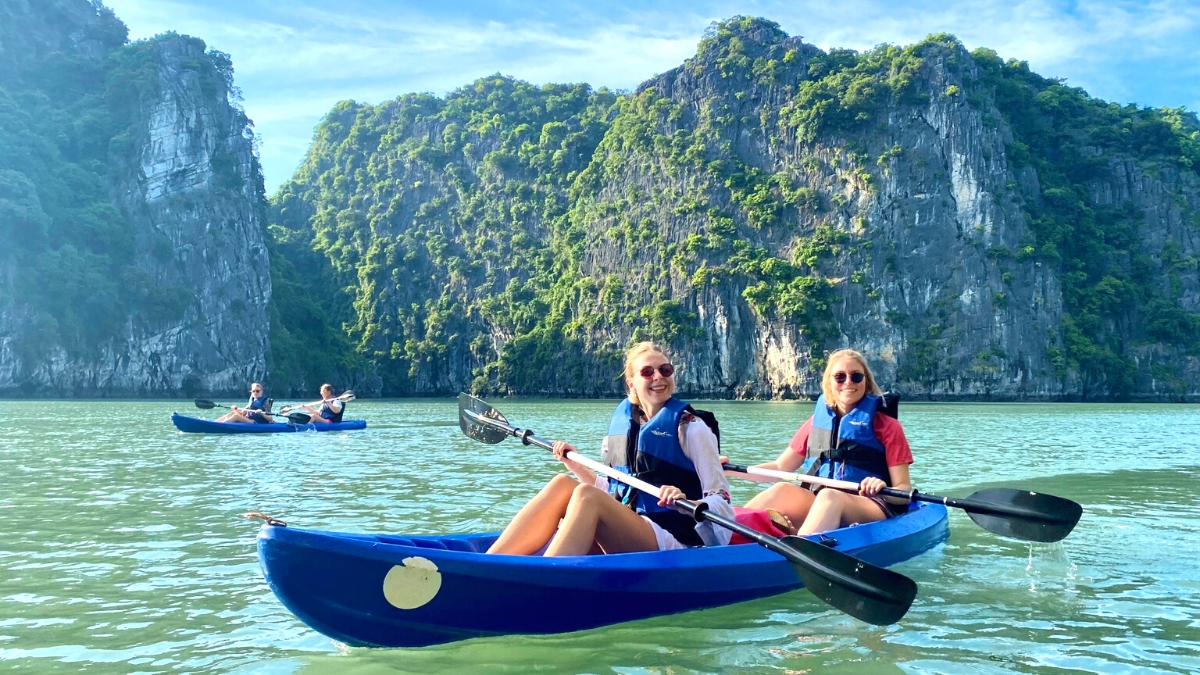 Kayaking among gorgeous Halong landscapes
