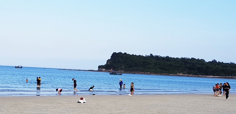 Halong Bay swimming - minh chau beach