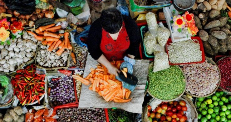 A Produce Vendor At The Market
