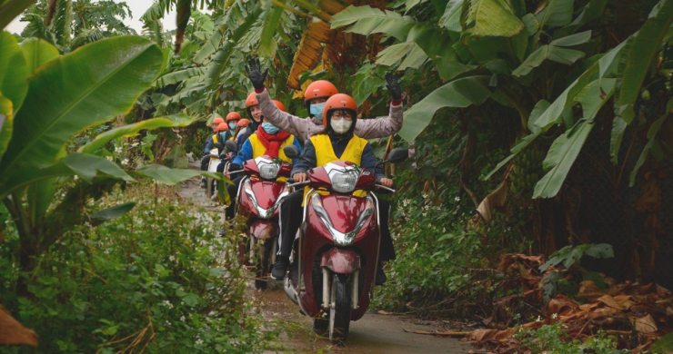 Travel Through The Banana Island On The Back Of A Motorbike