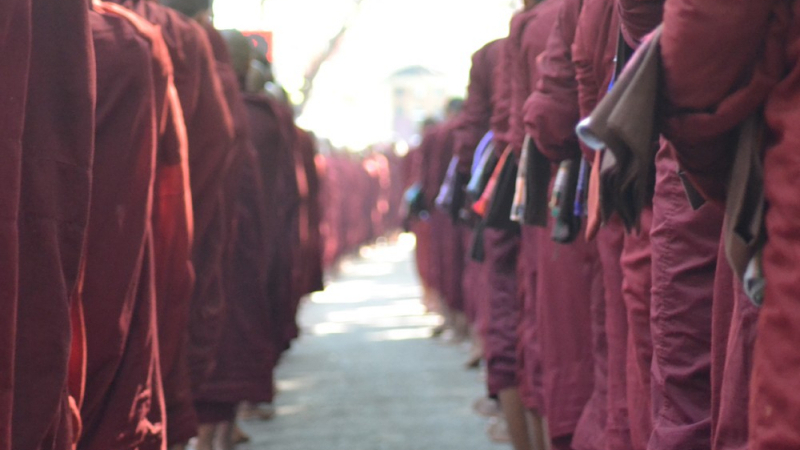 Monks queue for lunch at Mahagandayon Monastery