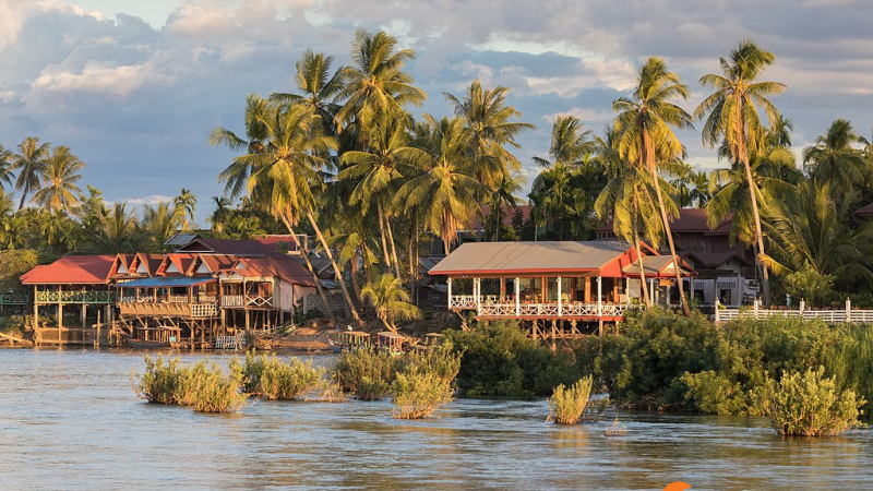 River Bank Of Don Khon With Stilt Wooden Houses At Golden Hour From Don Det Laos