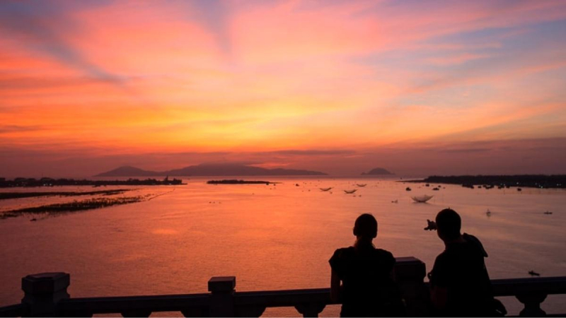 Witness Sunset On Cua Dai Bridge In Hoi An