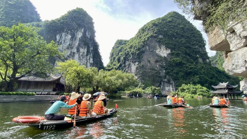 Cross Along The River To Immerse In Ninh Binh Nature