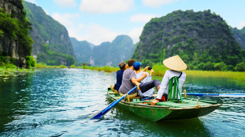 Enjoy The Nature On A Sampan Boat In Tam Coc