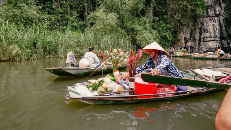 Day 1 Locals Selling Some Flowers And Fruits In Boat