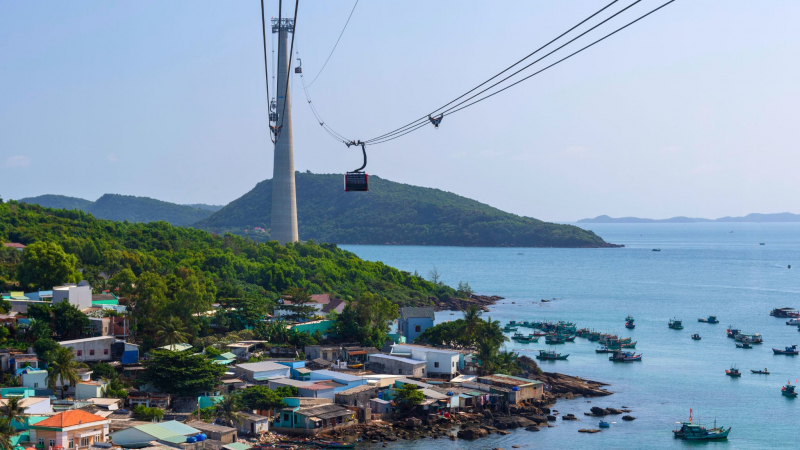 Admire The Pristine Natural Scenery And Fishing Boats On Hon Thom Cable Car