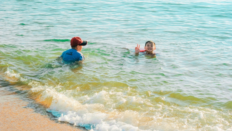 Swim In The Crystal Clear Waters With Its Breathtaking Scenery At Doc Let Beach