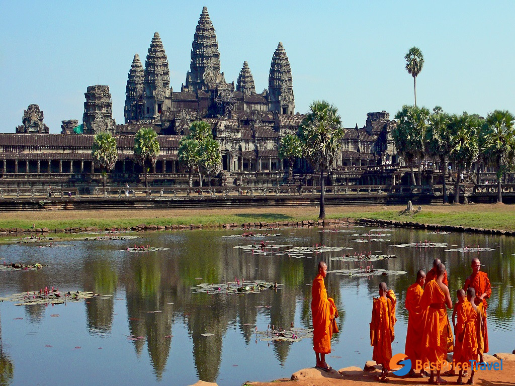 Buddhist Monks In Front Of The Angkor Wat