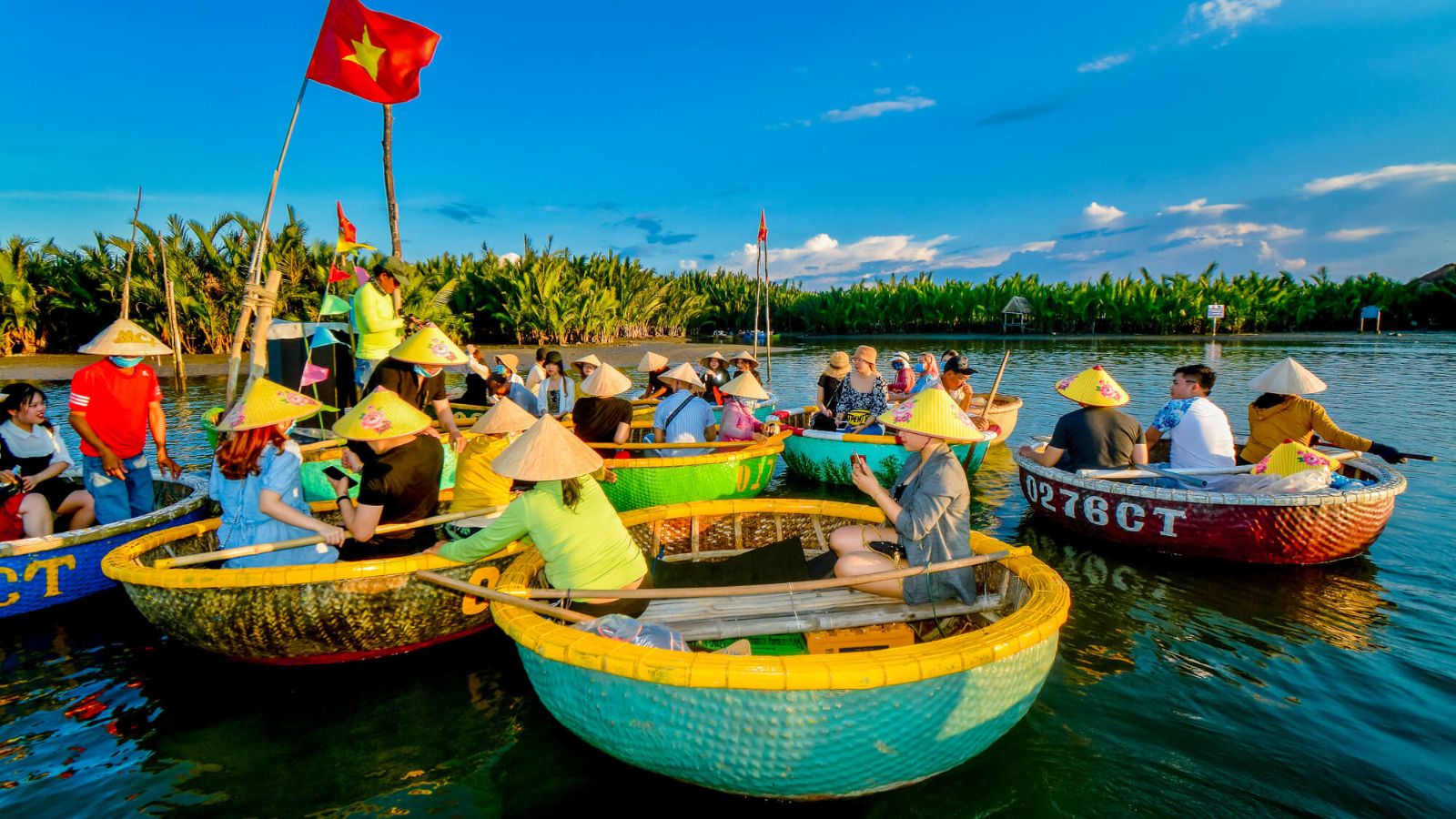 A Bustling Scene Of Life And Activity On Cam Thanh River