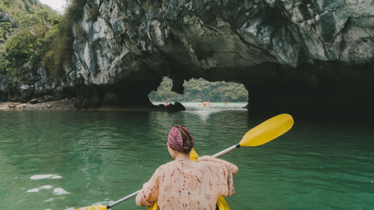 Kayaking In The Crystal Water In Halong Bay