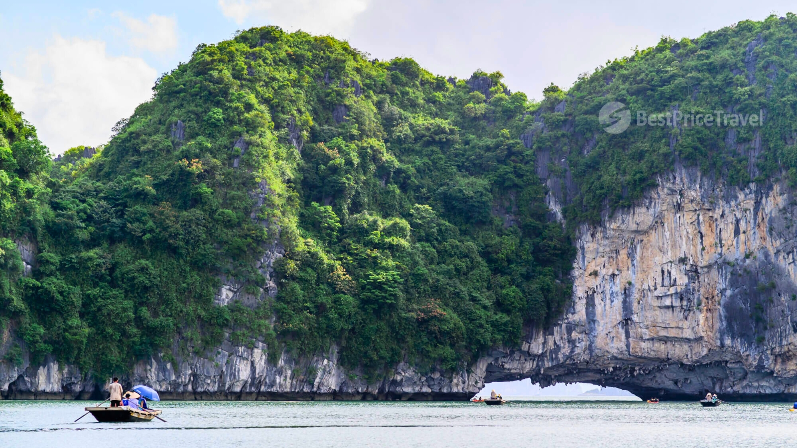 Enjoy the majestic Halong Bay's caves on a  bamboo boat