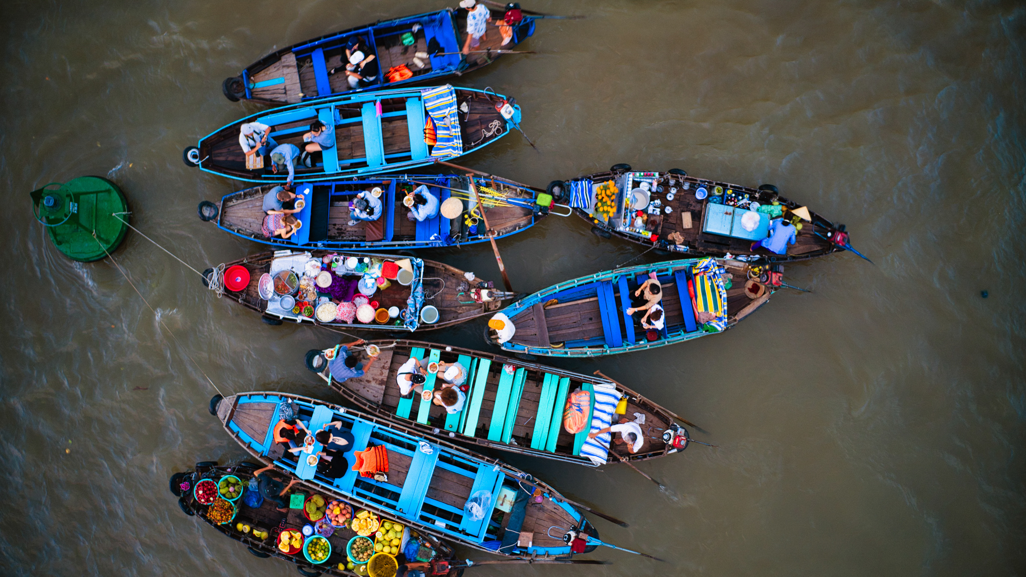 Visit the active Cai Rang floating market